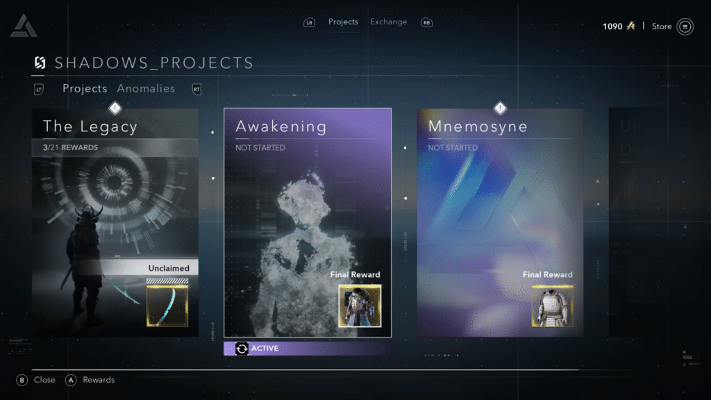 Screenshot from the “Shadows_Projects” menu in Assassin’s Creed: Shadows showing project tiles titled “The Legacy,” “Awakening,” and “Mnemosyne.” “The Legacy” has 3/21 rewards unlocked with a sword as a reward, while “Awakening” is active and “Mnemosyne” is not started. Each project includes a final gear reward previewed at the bottom.